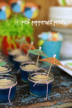 small jars filled with food on top of a table