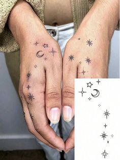 two hands with stars and moon tattoos on them