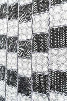 an abstract black and white pattern on fabric