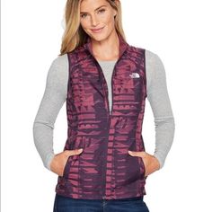 The North Face Rapida Vest In Amaranth Purple Print. Slim Fit. In Perfect Condition. Flash Dry Technology Durable Water Repellent Finishes Two Front Zip Pockets, One Back Zip Pocket And Cinch-Able Bottom Hem. 100% Polyester Size Medium: Length: 25” Pit To Pit: 18” North Face Vest, The North Face Purple, North Face Purple, Quilted Puffer Vest, Puffy Vest, Reversible Vest, Hooded Vest, Amaranth, Vest White