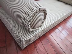 a bed that is sitting on the floor