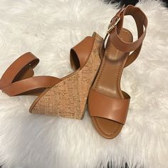 Brand New Tommy Hilfiger Cognac Wedges With Adjustable Ankle Strap. Gold Color Hardware. Size 9 And 1/2. Fit True To Side. Between 4.5 And 4.75 Inch Heel With An Inch Platform Measured On Front Of Shoe. Original Owner Pet Free/Smoke Free Home. Casual Open Toe Heels By Tommy Hilfiger, Tommy Hilfiger Round Toe Heels For Spring, Casual Summer Heels By Tommy Hilfiger, Tommy Hilfiger Summer Casual Heels, Tommy Hilfiger Casual Summer Heels, Casual Tommy Hilfiger Summer Heels, Chic Spring Tommy Hilfiger Heels, Chic Tommy Hilfiger Spring Heels, Tommy Hilfiger Spring Wedge Sandals With Round Toe