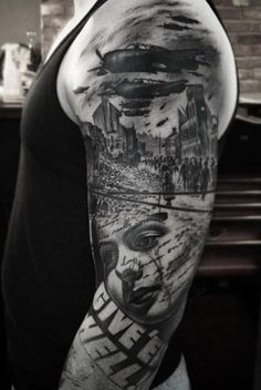 a man's half sleeve with an image of the city and his face on it