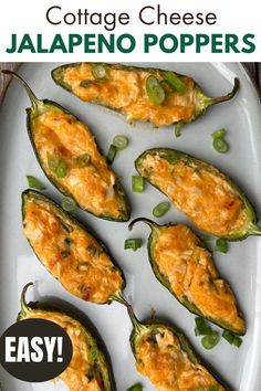 an egg and cheese stuffed jalapeno poppers on a white plate with green peppers