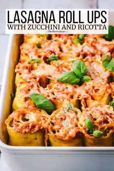 lasagna rolls with zucchini and ricotta in a casserole dish