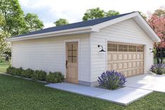 a small white garage sitting on top of a lush green field