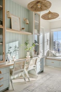 a living room filled with furniture next to a window covered in wicker coverings