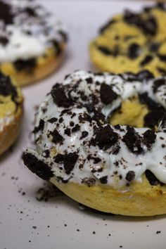 chocolate chip cookies and cream doughnuts on a white plate