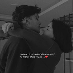 a man and woman kissing each other with the caption my heart is connected with your heart, no matter where you are