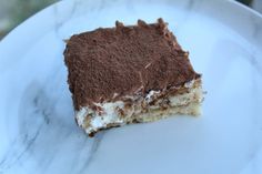 a piece of cake sitting on top of a white plate