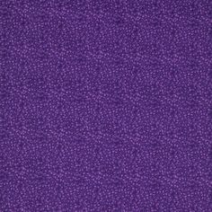 purple fabric textured with small dots