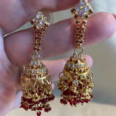 These Amazing Red And Gold Tone Earrings Will Send A Statement From The Wearer. Totally Over The Top. Fun And Sparkly. Never Worn.0.32oz In Weight Each With The Back On. Elegant Red Ruby Jhumkas, Elegant Red Round Jhumkas, Red Bridal Earrings For Formal Festivals, Red Bridal Earrings For Formal Occasions, Red Bridal Earrings For Formal Events, Red Latkans Dangle Bridal Earrings, Red Ruby Bridal Earrings For Festivals, Red Danglers For Party, Red Dangle Earrings With Latkans