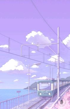 a green train traveling down tracks next to the ocean under a purple sky with clouds