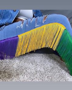 This is hand crafted Denim Fringe Jeans Comes in the 3 Mardi Gras Essentials colors  Skinny Fit Jeans - Stretch  Distressing is made to each pair Nola Decor, Customized Clothes, Denim Fringe, Fringe Pants