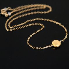 "A single medium flat coin disc on 24K gold Vermeil is focal of this simple necklace. ♥ 8mm medium coin disc with sparkling starburst finish in 24K Gold VERMEIL* (*24k gold over .925 Sterling Silver). ♥ Dainty (but sturdy) cable chain, secured with 5mm spring ring clasp and embellished with 3mm Swarovski crystals, or cultured freshwater rice pearls, or 2mm gold filled round beads ~ see 4th pic. ♥ The chain and the rest of the metal components are 14K GOLD FILLED (not plated). ♥ Choose your neckl Gold Minimalist Coin Necklace With Adjustable Chain, Gold Coin Necklace For Everyday, Minimalist Yellow Gold Circle Coin Necklace, Minimalist Yellow Gold Coin Necklace With Round Pendant, Dainty Gold Circle Coin Necklace, Simple Gold Round Disc Necklaces, Simple Gold Round Disc Necklace, Yellow Gold Coin Necklace With Delicate Chain, Minimalist Gold Coin Jewelry