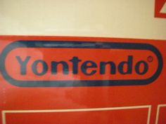 the yontendo sign is red and black