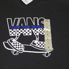 Vans "Off The Wall" Board Style T Shirt. Black And White Checkerboard Graphic With Blue Trim On The Front. Size L, Brand New With Tags. Vans Black Tops With Graphic Print, Vans Black Top With Graphic Print, Black Vans Tops With Graphic Print, Vans Black Crew Neck T-shirt, Black Vans Crew Neck T-shirt, Black Crew Neck T-shirt By Vans, Vans Black Graphic Tee, Casual Vans Tops With Graphic Print, Black Vans Crew Neck Top