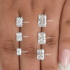 four caramel colored nails are shown with three different sizes of diamonds on each finger