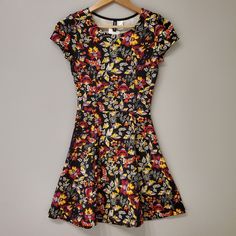 Short Sleeve Floral Dress - Dimensions: (Length) Approx. 31.5", (Pit To Pit) Approx. 13.25" Pink Slip Dress, Black Sparkly Dress, Short Sleeve Floral Dress, Lace Burgundy Dress, Long Sleeve Sequin Dress, Striped Bodycon Dress, Black Dress With Sleeves, Black Sweater Dress, Black Knit Dress