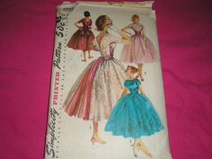 1950s Simplicity Sewing Pattern. Pattern # 1795 Evening Cocktail Party Dress and Cummerbund. Size 13 bust 33 waist 25 1/2 hips 35. Pattern has been neatly cut out and all 8 pieces are present. Vintage Empire Waist Party Dress, 1950s Style Fitted Party Petticoat, Fitted Dress With Vintage Pattern For Vintage Events, Vintage Pink Petticoat For Party, Pink Vintage Petticoat For Parties, Retro Fitted Petticoat For Wedding, Fitted Retro Petticoat For Wedding, Retro Fitted Wedding Petticoat, Vintage Fitted Petticoat For Wedding