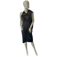 Elevate Your Formal Wardrobe With This Stunning Karen Millen Pencil Dress. The Dress Comes In A Beautiful Gray Color And Is Made Of Satin Fabric That Gives It A Luxurious Feel. The Fitted Dress Features Sleeveless Halter Neckline With A Bow Accent And A Zip Closure At The Back. Perfect For A Range Of Occasions Including Weddings, Christmas Parties, Holy Communions, Business Meetings Or Cocktail Parties, This Dress Is A Must-Have. The Dress Is A Size 10 And Has A Midi Dress Length. It Is Recommen Luxury Fitted Satin Midi Dress, Dress Satin, Christmas Parties, Midi Length Dress, Karen Millen, Halter Neckline, Pencil Dress, Stylish Dresses, Fitted Dress