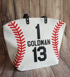 a baseball themed purse with the number 13 on it