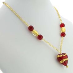 Every woman loves to own unique handcrafted jewelry. This Murano necklace in rich gold and red palette is every woman's dream, rich and beautiful like Venice itself. The authentic Murano necklace features an exquisite 24K gold-layered red heart pendant suspended from an elegant gold-lined beaded necklace accented with gorgeous 24K gold foil-lined Murano glass beads. Enjoy this unique Murano Necklace and the aura of Venetian romance and elegance that it projects. The heart measures 1 inch in heig Unique Handcrafted Jewelry, Murano Glass Jewelry, Murano Glass Beads, Gold Heart Necklace, Fancy Jewelry, Glass Heart, Elegant Accessories, Glass Jewelry, Murano Glass