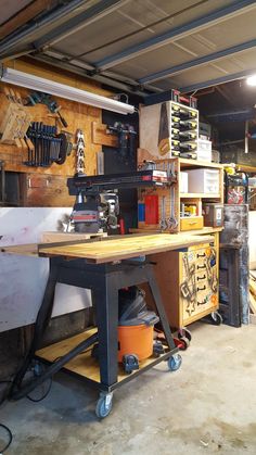 a workbench in a garage with lots of tools