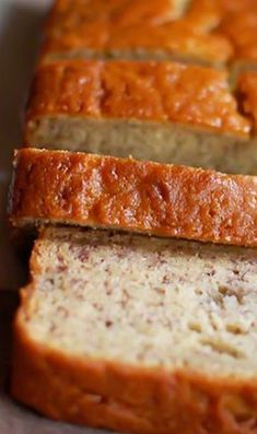 sliced loaf of banana bread sitting on top of a counter