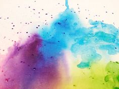 an abstract painting with blue, green, and purple colors on it's surface