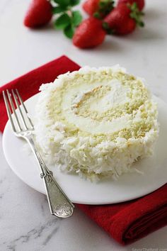 a plate with a cake and fork on it