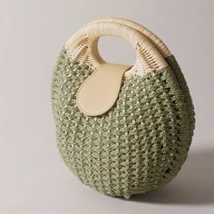 Handmade Bamboo Round Bag (Green) Designer Original Elevate Your Style With This Stunning Handmade Bamboo Round Bag, Designed For Those Who Appreciate Unique, Eco-Friendly Fashion. This One-Of-A-Kind Accessory Combines Natural Beauty With Functional Design, Making It The Perfect Statement Piece For Any Occasion. Features: Distinctive Round Design: A Modern Twist On Classic Shapes, This Bag Adds A Touch Of Sophistication To Any Outfit. Premium Bamboo Material: Crafted From High-Quality Bamboo, This Bag Showcases An Earthy, Sustainable Aesthetic. Soft Cotton Lining: The Interior Features A Comfortable Cotton Lining, Providing A Gentle And Protective Environment For Your Essentials. Perf Chic Khaki Straw Bag For Summer, Everyday Khaki Straw Bag For Summer, Summer Everyday Khaki Straw Bag, Green Handheld Bucket Bag With Adjustable Strap, Handheld Green Bucket Bag With Adjustable Strap, Summer Hobo Bag With Adjustable Strap For Errands, Green Handheld Bucket Bag For Errands, Handheld Green Bucket Bag For Errands, Green Casual Handheld Hobo Bag