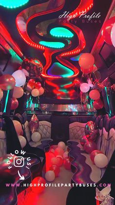 the inside of a party bus decorated with balloons