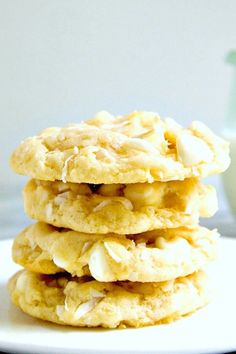 a stack of cookies sitting on top of a white plate