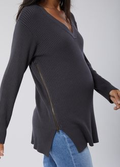 If you only buy one sweater this season, this is it! A cozy rib favorite that can be worn through all stages of pregnancy, then transition to a nursing workhorse postpartum. It’s all thanks to functional zippers along each side. Unzip as you grow for a custom fit, then get discreet nursing access once babe arrives. 78% viscose / 22% polyester Turn inside out and machine wash cold. Wash separately using a gentle cycle. Reshape and lay flat to dry in shade. Cool iron if needed. Do not bleach or dr