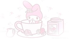 hello kitty in a teacup with pink roses