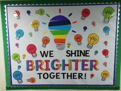 we shine brighter together bulletin board with colorful lightbulbs and handwritten words