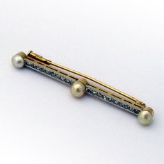 "Antique French 18 K (.750) gold bar brooch, decorated with Rose Cut Diamonds and Baroque Pearls. This stately brooch is 2 1/4\" long and weighs 5.8 grams. EA641" Classic Yellow Gold Brooches For Wedding, Formal Yellow Gold Brooch Pins, Classic Yellow Gold Wedding Brooches, Elegant Yellow Gold Brooches For Ceremonial Wear, Elegant Yellow Gold Brooches For Ceremonial Occasions, Luxury Yellow Gold Pins For Formal Occasions, Art Deco Yellow Gold Brooches For Formal Occasions, Elegant Gold Pins, Yellow Gold Art Deco Brooches For Formal Wear