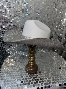 The original "Rhinestone Cowgirl" Rhinestone Party Hat For Kentucky Derby, Western Style Party Top Hat With Short Brim, Party Hats With Rhinestones And Curved Brim, Western Style Party Top Hat With Curved Brim, Western Style Top Hat With Curved Brim For Party, Fitted Western Party Hats, Western Style Curved Brim Top Hat For Party, Fitted Tall Crown Hat For Party, Party Hats With Rhinestones And Short Brim