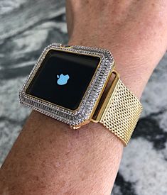 For Series 4 and 5 In the 40 or 44mm only please click on the options bar for the correct size and series that is written on the back of your watch. This will not fit the white ceramic version of the Apple Watch Available in Silver,Rose Gold,Yellow Gold and Black in my shop This gorgeous custom baguette Lab Diamond Yellow Gold Apple Watch Cover and yellow gold stainless steel mesh Milanese band (can be purchased as a set or just the band)for the 40mm or 44mm and is set by hand with the finest gr Modern Gold Apple Watch Band As A Gift, Modern Gold Watch Accessories For Gifts, Modern Gold Watch Accessories As Gift, Yellow Gold Rectangular Watch Bands For Gift, Yellow Gold Rectangular Watch Bands As Gift, Adjustable Gold Rectangular Apple Watch Band, Rectangular Yellow Gold Watch Bands For Gift, Rectangular Yellow Gold Watch Bands As Gift, Modern Gold Rectangular Watch Band