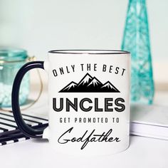 a coffee mug that says, only the best uncle's get provided to godfather