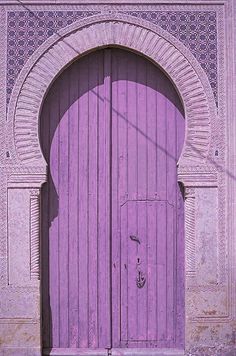 an old wooden door is shown in blue