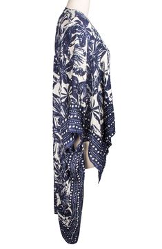 Whether you're going for a stroll under the sun or out for an evening, this ultra lightweight duster will radiate opulence. 26" L x 51" W Open front 3/4 length sleeves
 Side vents All-over print Woven 100% rayon Hand wash cold, line dry Imported Model stats: 5'10", 32" bust, 25" waist, 36" hip. Summer Beach Outerwear With 3/4 Sleeve, Long Sleeve Summer Kimono For Daywear, Summer Long Sleeve Kimono For Daywear, Spring Beach Outerwear With 3/4 Sleeves, Beach Outerwear For Spring With 3/4 Sleeves, Long Summer Outerwear With Floral Print, Bohemian Summer Outerwear With 3/4 Sleeves, Printed Long Sleeve Summer Outerwear, Bohemian Outerwear With 3/4 Sleeves For Summer