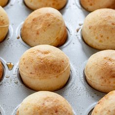 freshly baked muffins sitting in a baking pan