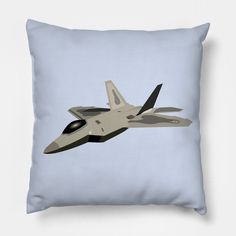 a grey fighter jet flying in the sky on a blue pillow cover with black piping