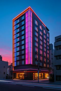 A modern hotel with neon lights highlighting the building’s geometric patterns and sharp angles. Modern Hotel