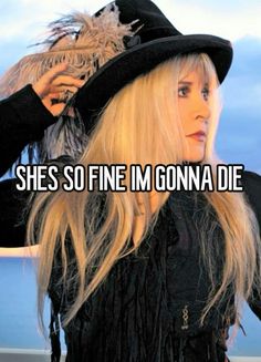 a woman with long blonde hair wearing a black hat and fringed dress, text reads she's so fine im gona die