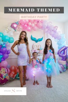 A image of a mom and two daughters dressed in mermaid themed dresses standing in front of a mermaid themed birthday party Under The Sea Birthday Party Outfit, Sea Themed Birthday Party, Pink Playhouse, Mermaid Themed Birthday Party, Themed Birthday Party Ideas, Mermaid Theme Birthday Party, Magical Mermaid, Mai Thai, Kids Themed Birthday Parties