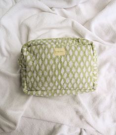 As a makeup enthusiast with a passion for all things beauty, I created these bags to combine functionality and style. Fully Lined and machine washable for ultimate convenience. Measurements: width: 10 inches, height: 7 inches, depth: 4 inches Green Zipper Pouch For On-the-go, Modern Green Rectangular Case Bag, Practical Green Portable Bag, Practical Rectangular Cosmetic Bag With Removable Pouch, Practical Rectangular Cosmetic Bag For Storage, Practical Rectangular Cosmetic Storage Bag, Green Travel Cosmetic Bag With Zipper, Trendy Green Travel Cosmetic Bag, Green Rectangular Cosmetic Bag For On-the-go