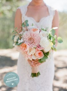 a bride holding a bouquet of pink and white flowers